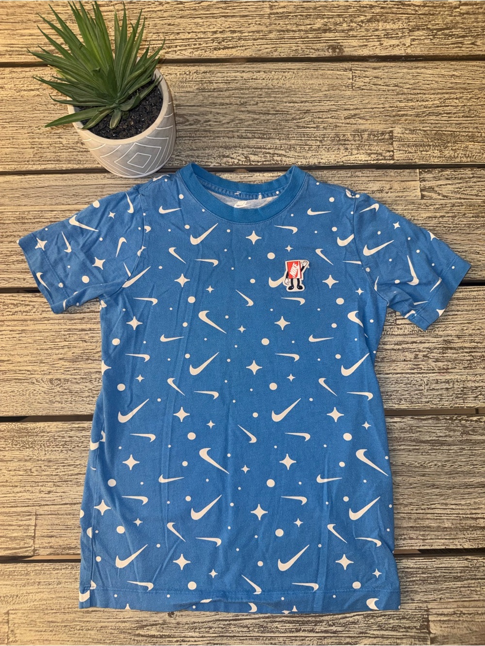 Nike Blue Kids' Short-Sleeve Graphic Tee with White Swoosh Pattern, Sz Medium
